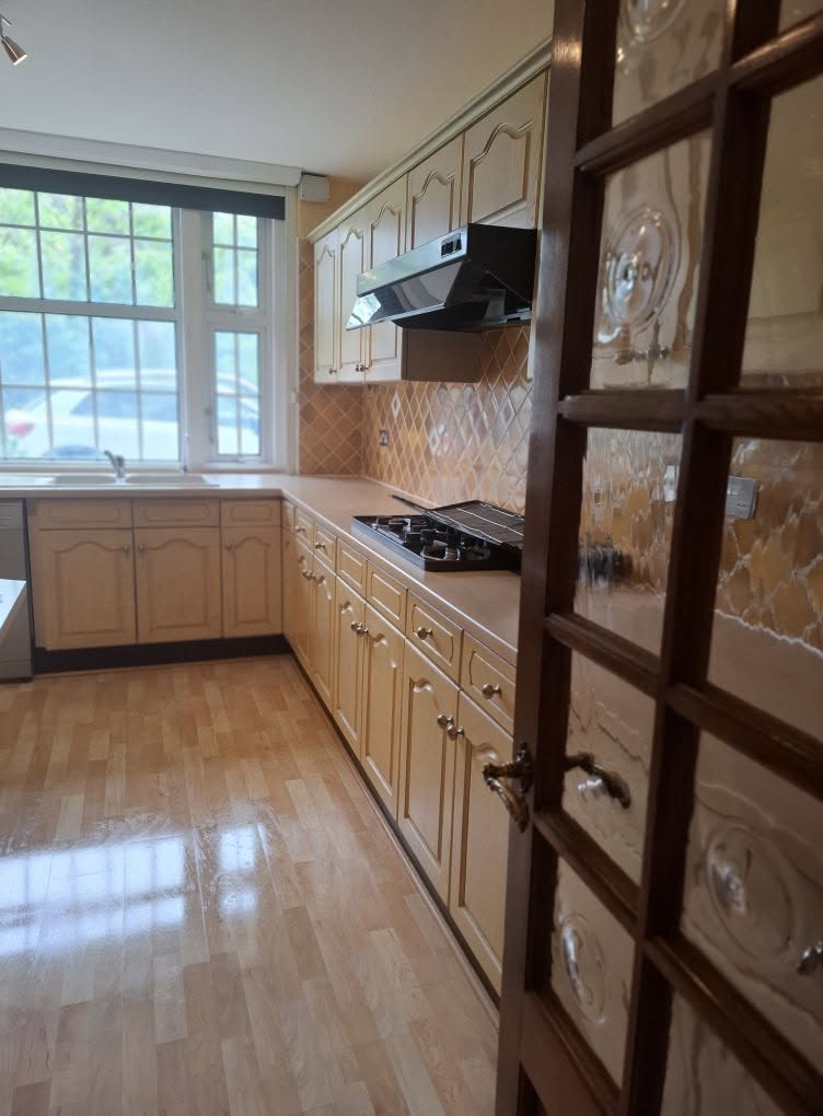 A clean, bright kitchen in an older person's home