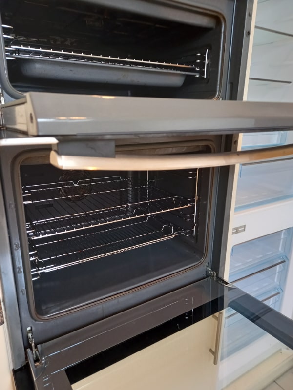 An oven cleaned inside and out as part of an end of tenancy clean